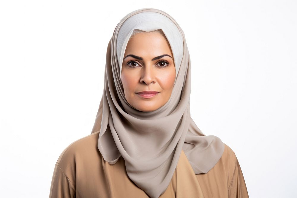 Emirati middle aged woman portrait scarf white background.