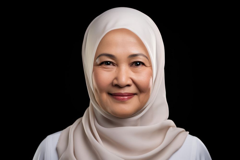Middle aged malaysian woman adult smile headscarf.