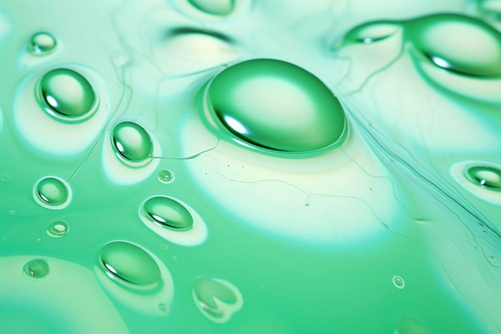 Pastel green ink drop in water background backgrounds condensation accessories.