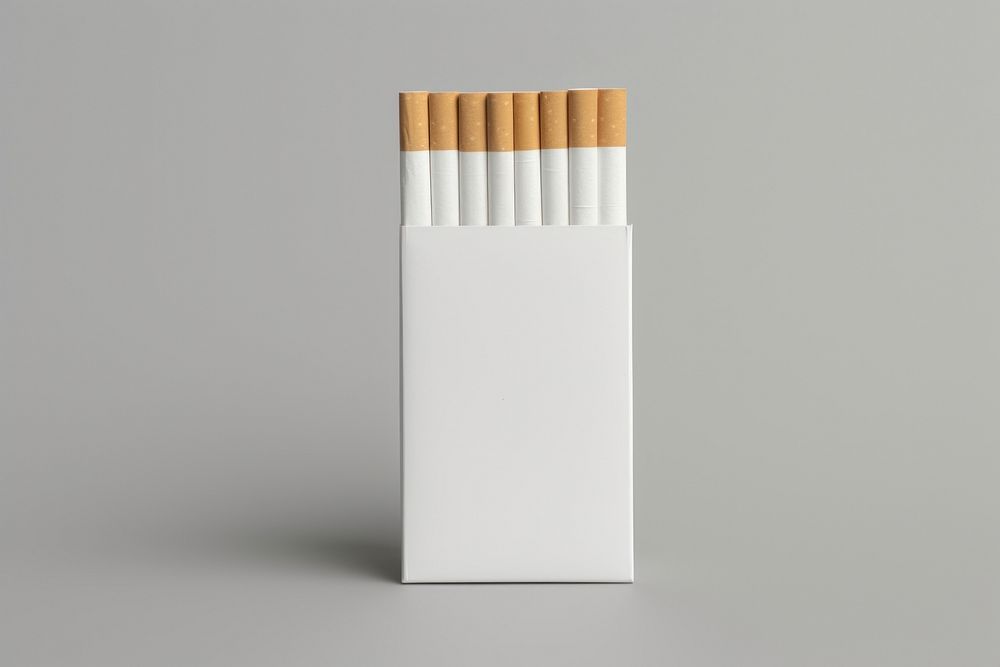 Cigarettes package gray background eraser pencil.