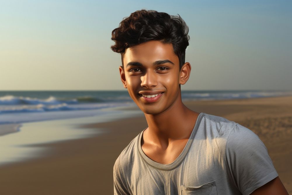 Indian teen age man portrait beach smile.
