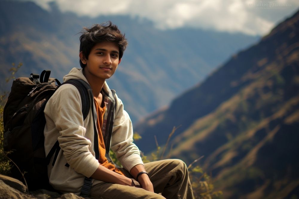 Indian teen age man adventure mountain portrait.