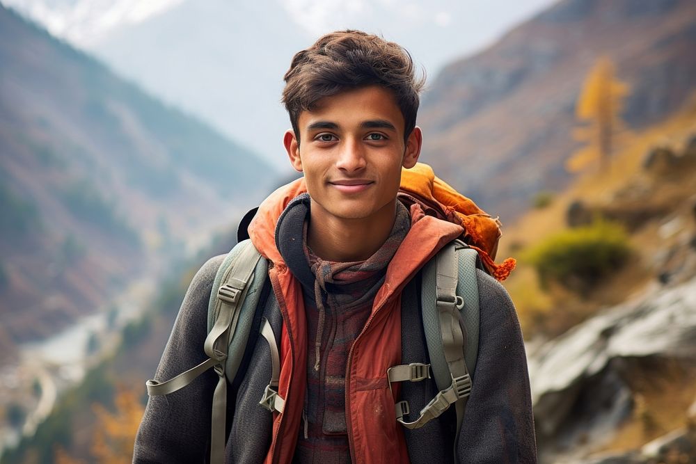 Indian teen age man mountain travel smile.
