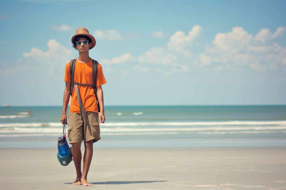 Indian teen age man travel shorts beach.