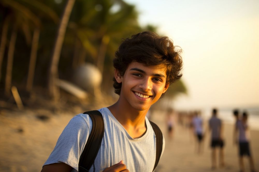 Indian teen age man beach portrait outdoors.