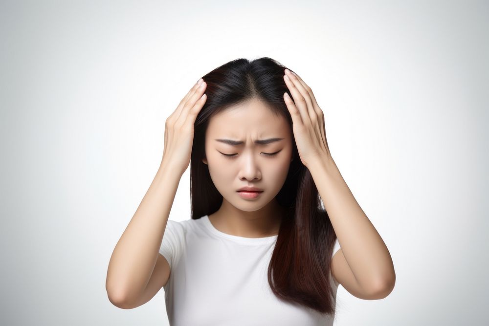 Asian woman pain head disappointment. AI generated Image by rawpixel.