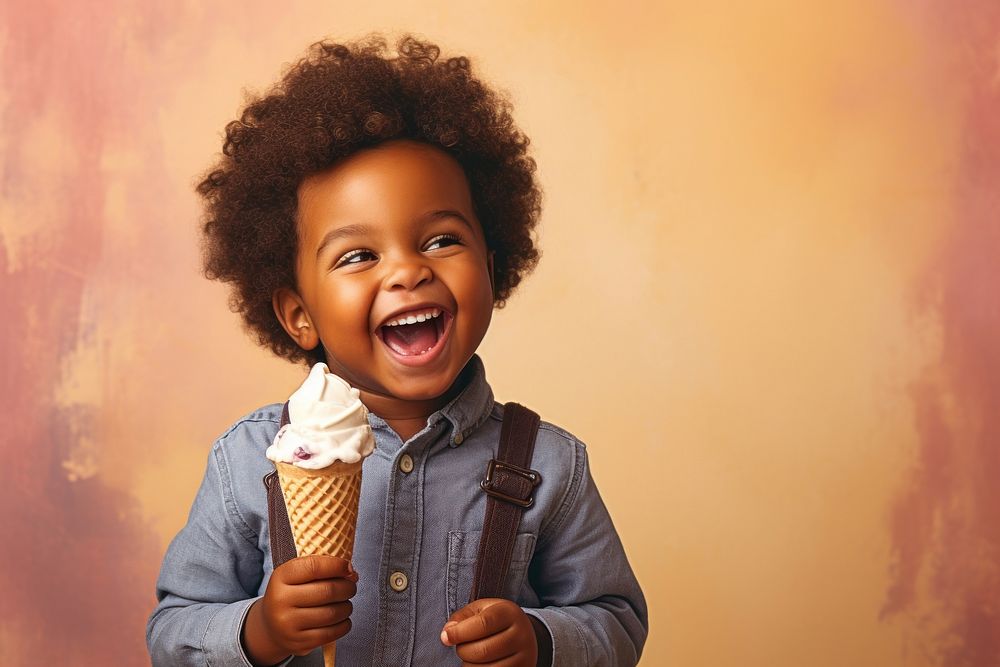 Black little boy eating smile cream baby.