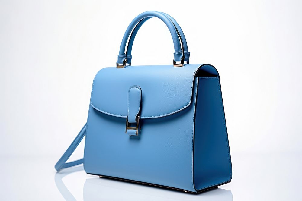 Blue leather women handbag purse white background accessories.