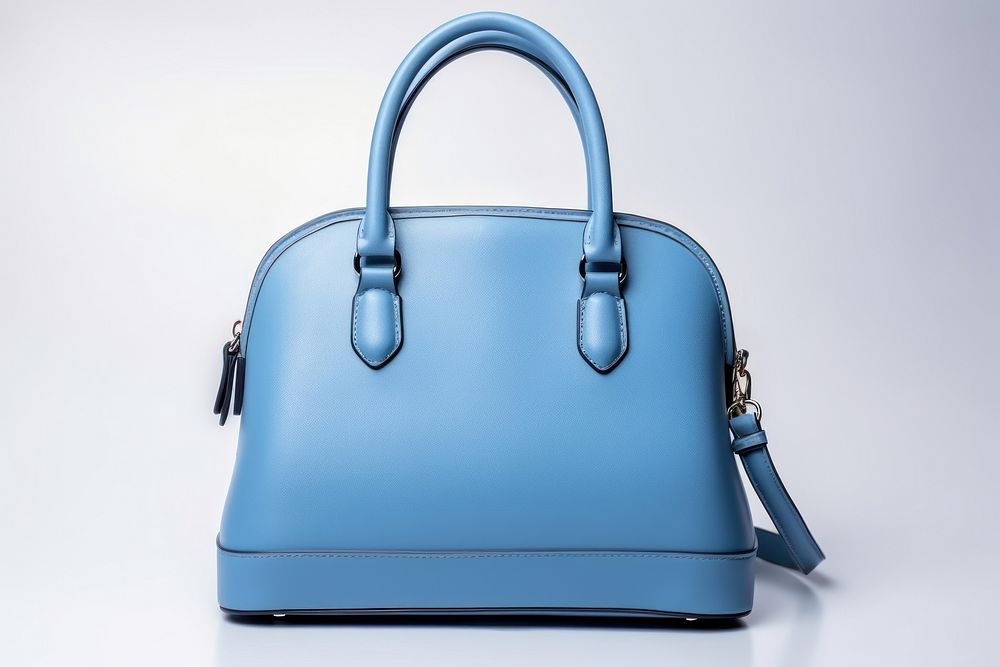 Blue leather women handbag purse white background accessories.