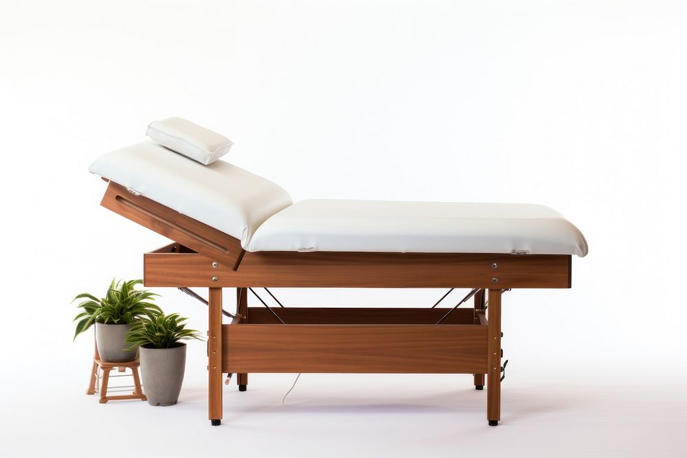 Massage bed furniture white background architecture.