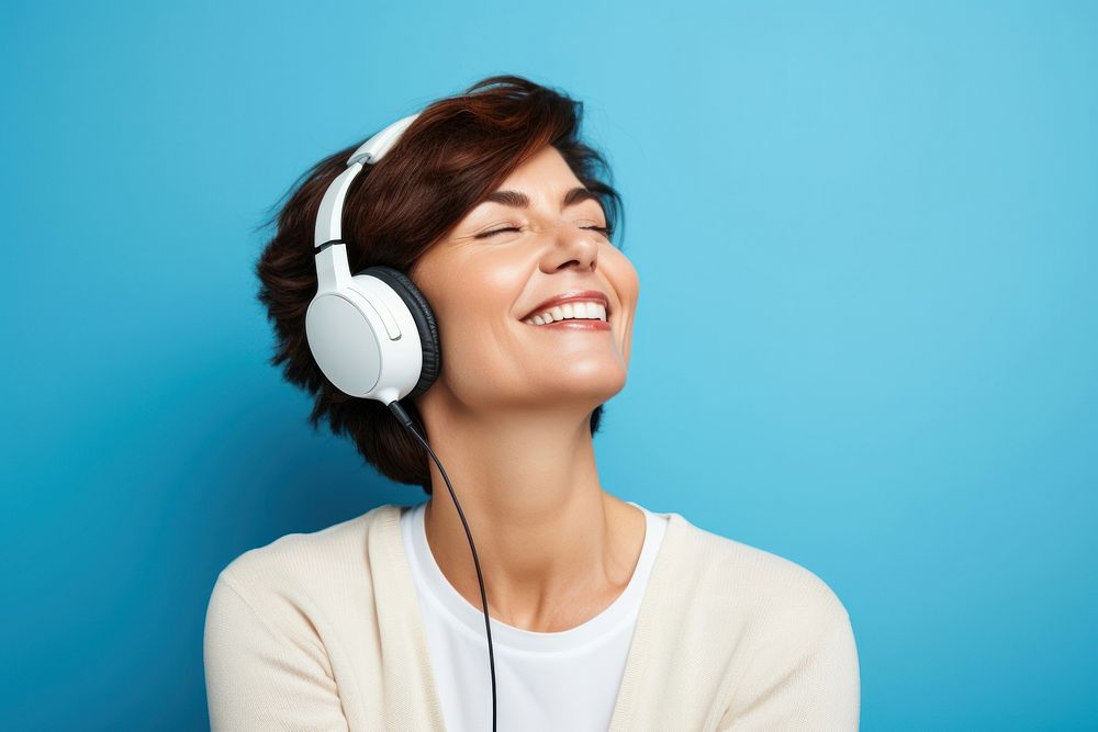 Mature woman headphones headset smile.