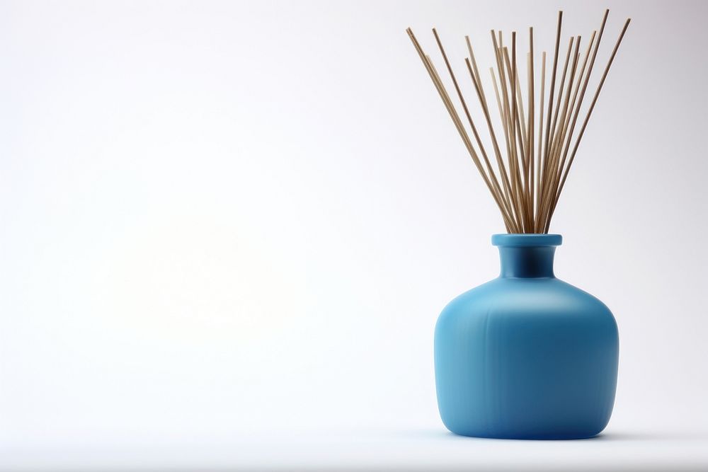 Reed oil diffuser bottle vase blue. AI generated Image by rawpixel.