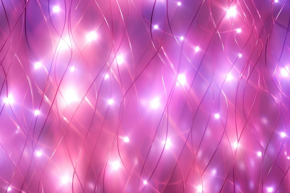 Pink christmas lights blurry pattern purple illuminated backgrounds.