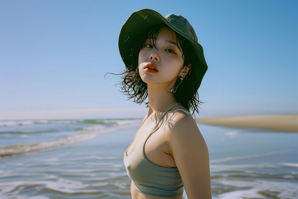 Korean woman beach swimwear portrait.