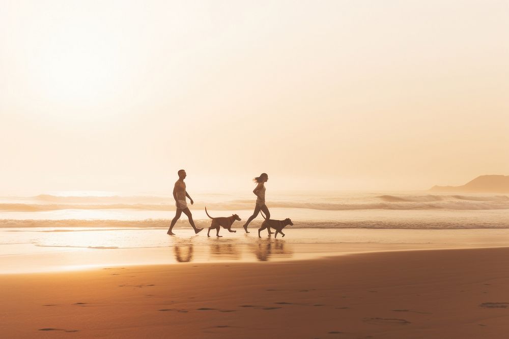  Thai couple running with dogs animal mammal beach. AI generated Image by rawpixel.