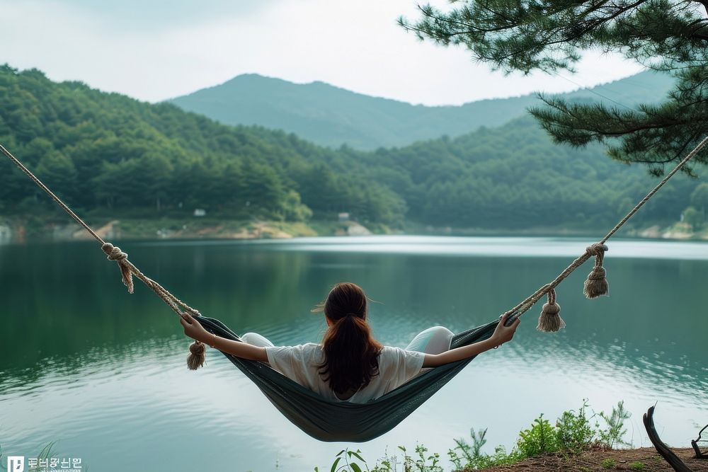 Korean woman mountain outdoors hammock.