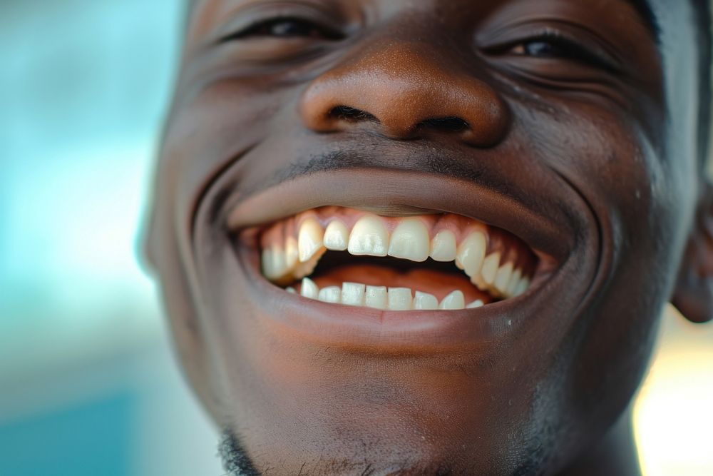 Man smiling teeth laughing smile.