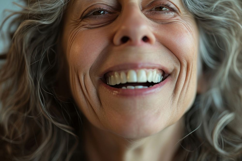 Woman smiling laughing adult teeth.