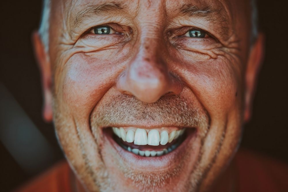 Man smiling laughing adult teeth.
