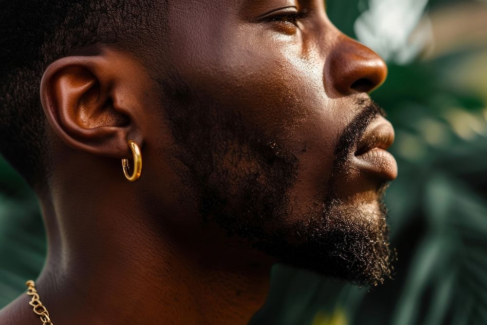 Golden hoop earrings jewelry adult man. AI generated Image by rawpixel.