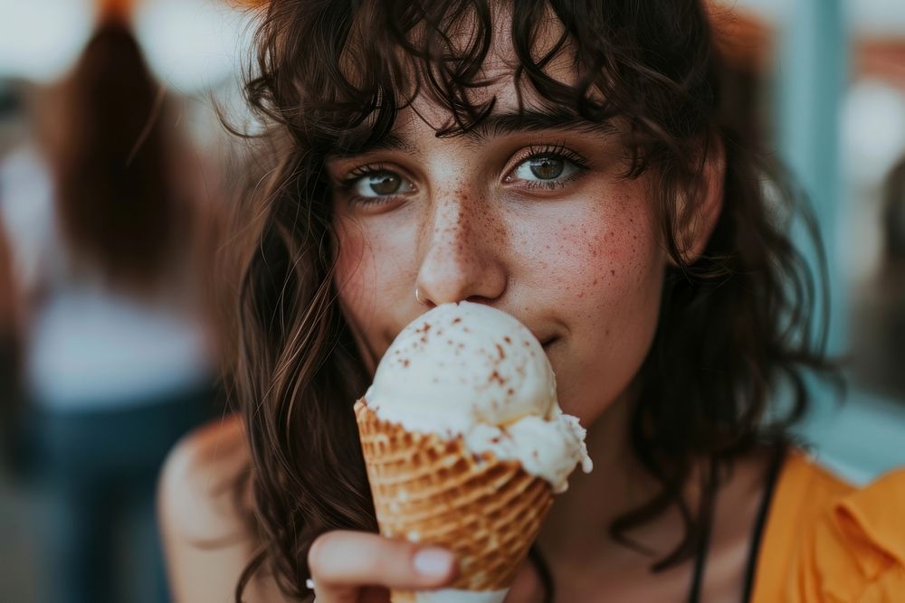 Woman eating ice cream cone dessert adult food.
