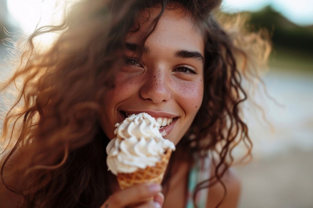 Woman eating ice cream cone dessert smile food.