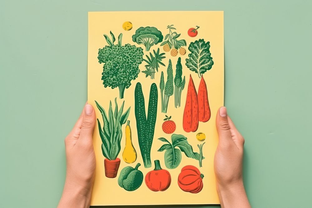 Vegetables holding green plant.