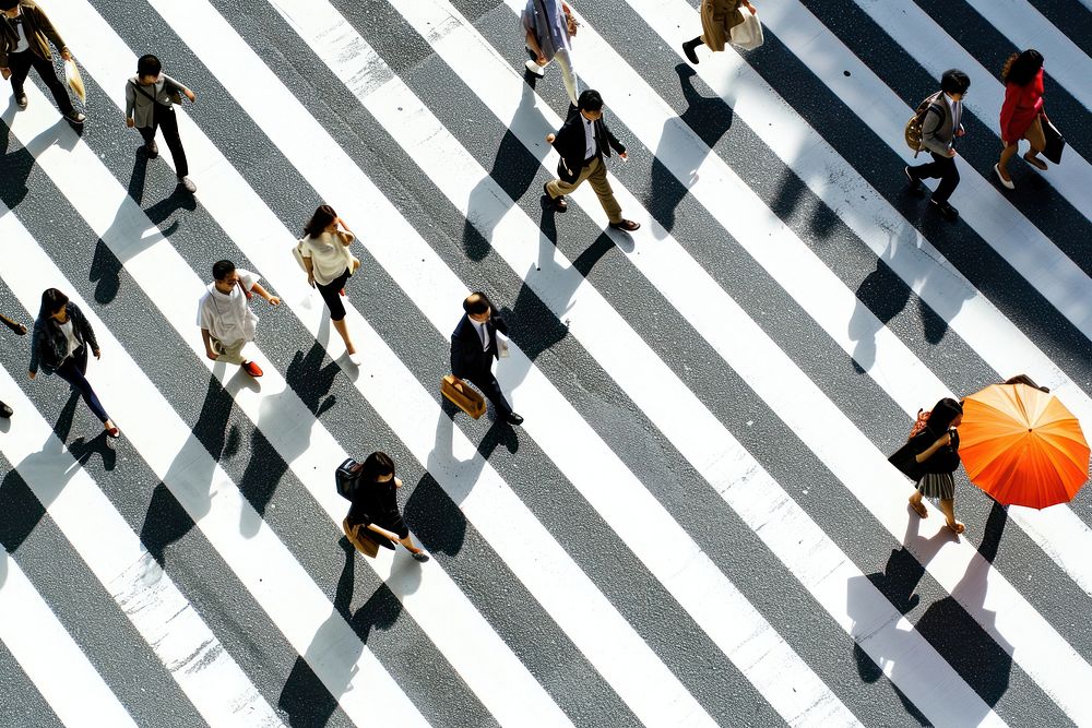 Japanese people walking across the zebra crossing in tokyo road architecture backgrounds.