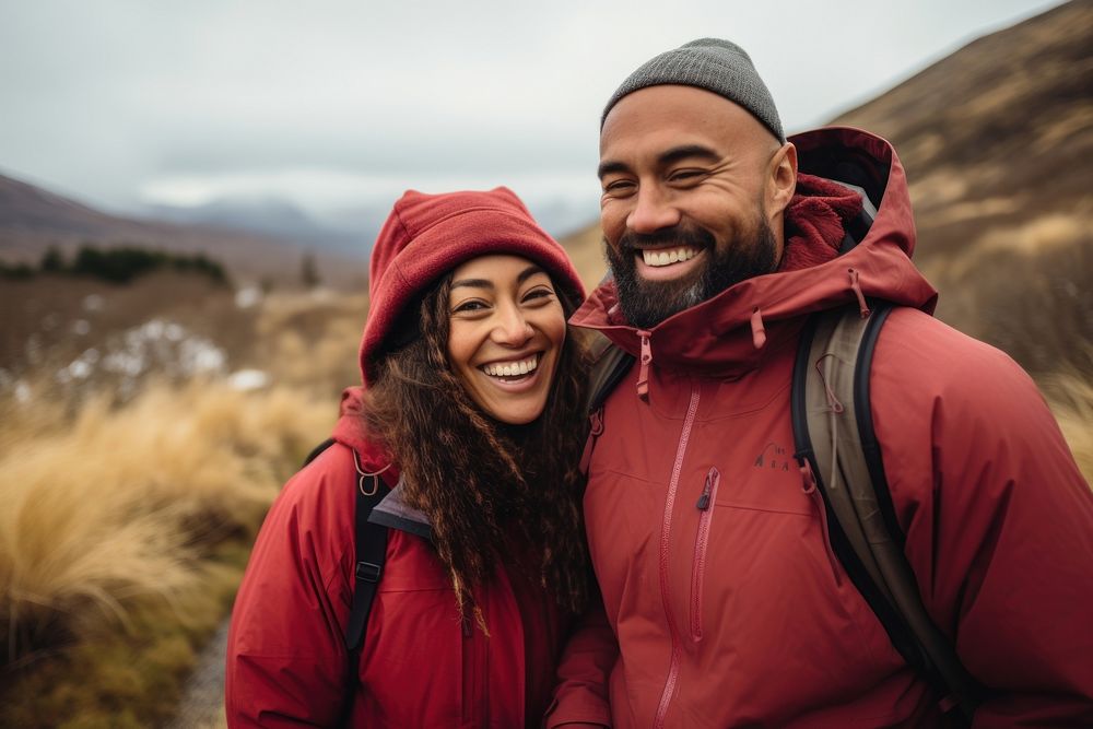 Samoan couple hiking outdoors jacket adventure.