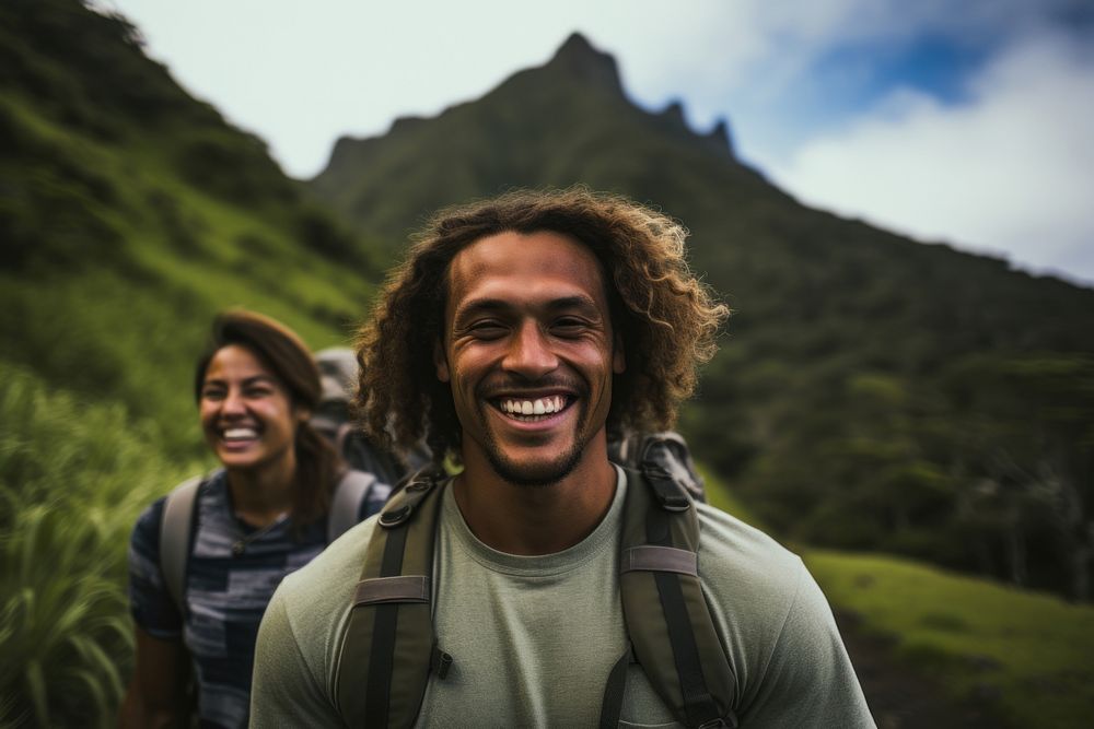 Young Samoan friends laughing hiking adult.