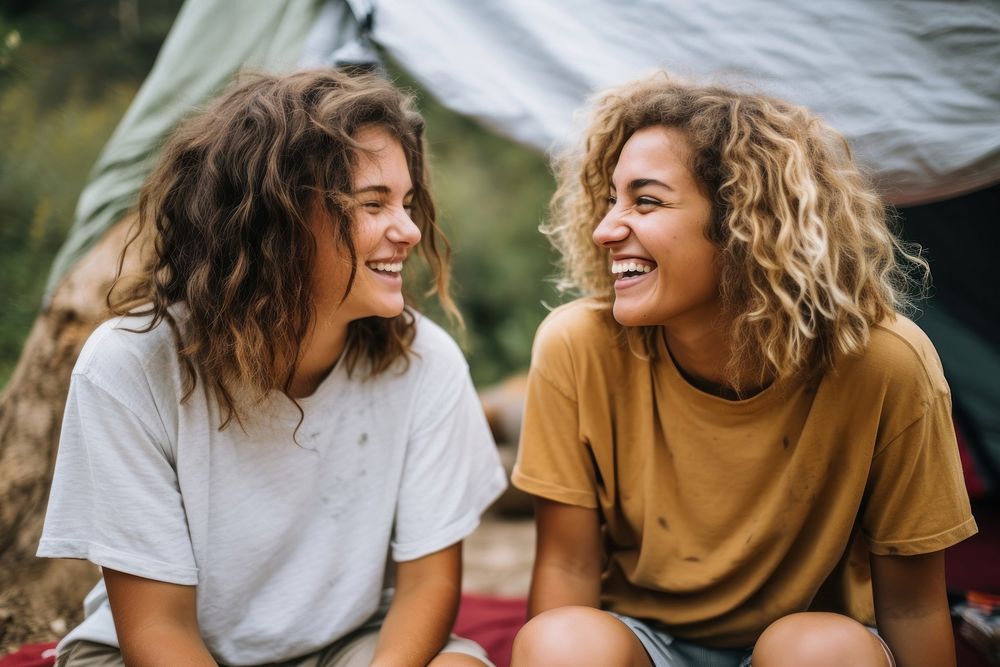 Friends having conversations laughing outdoors smile. AI generated Image by rawpixel.