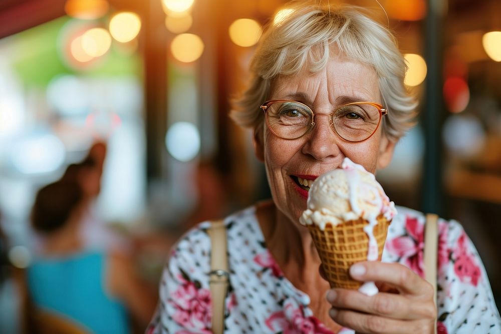 Woman eating ice cream cone dessert glasses adult.