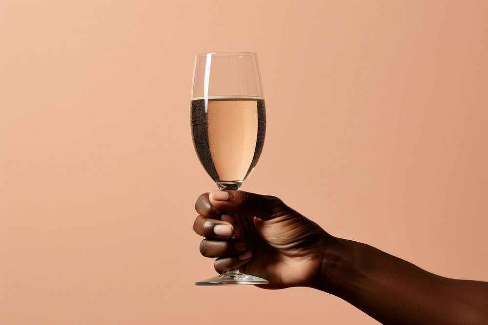 Glass of champagne holding drink adult.