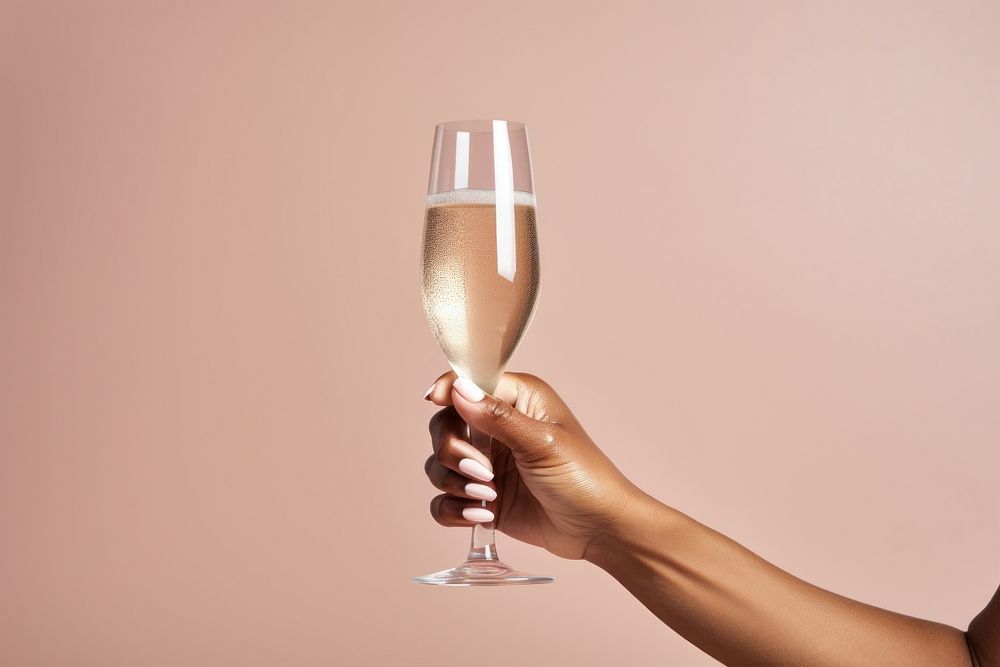 Glass of champagne holding drink adult.