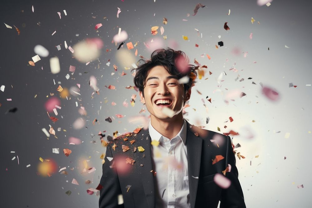 Cheerfully smiling confetti laughing adult.