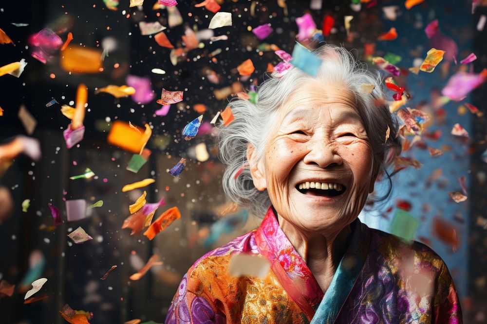 Cheerfully smiling confetti laughing portrait.