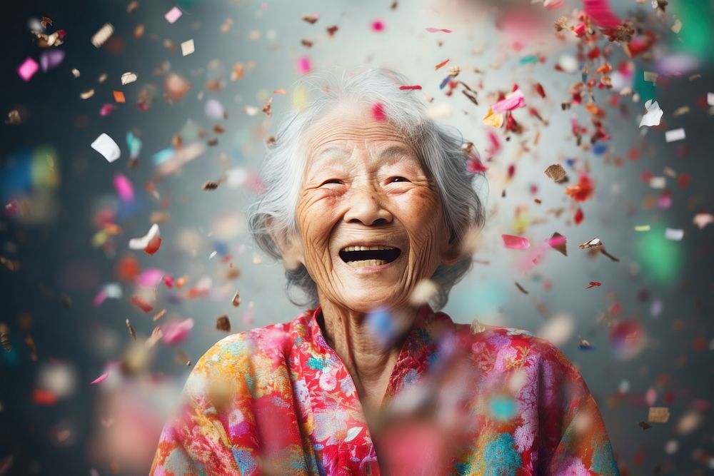Cheerfully smiling confetti laughing adult.