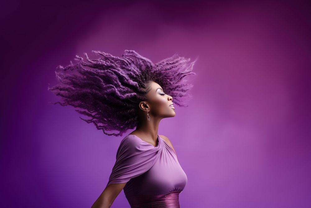 Shaking beautiful Afro braids purple adult woman.
