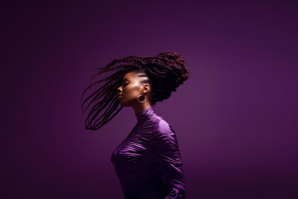Shaking beautiful Afro braids purple adult woman.