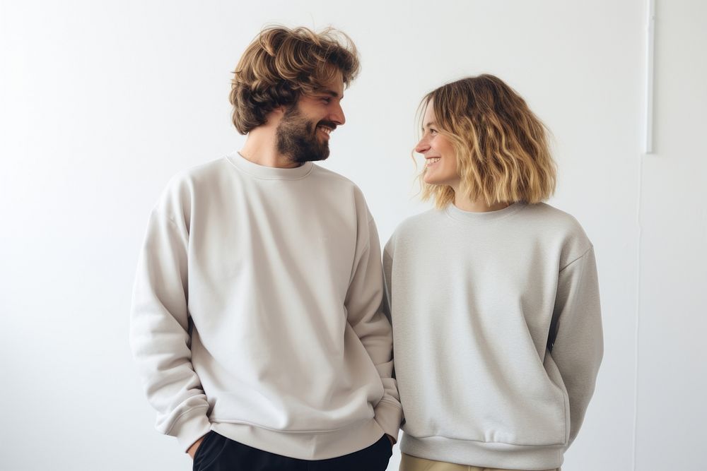 Couple sweatshirt sweater sleeve.