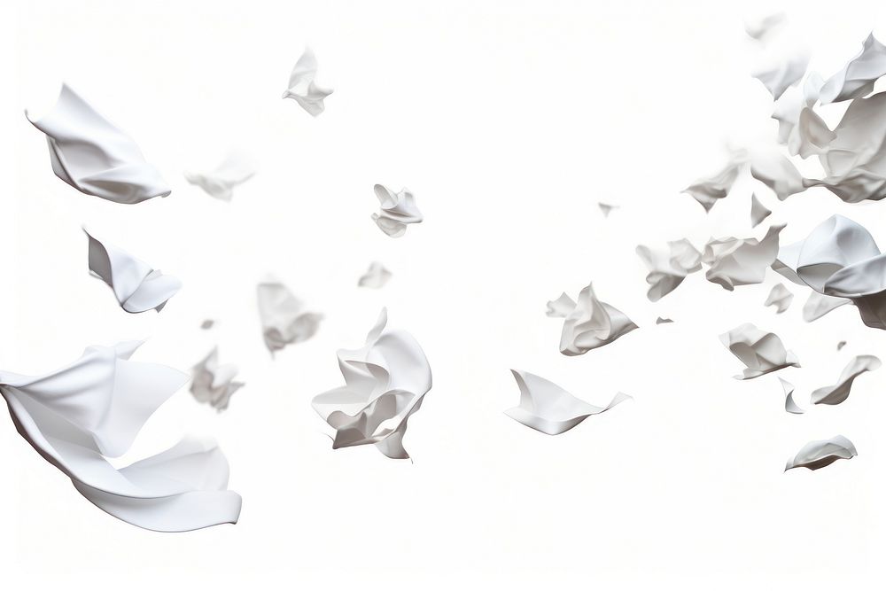 Pieces of crumbled paper backgrounds flying white.