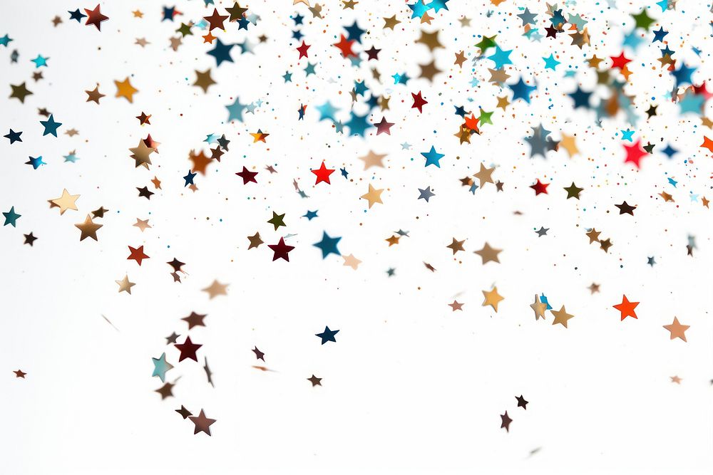 Pieces of star-shaped confetti backgrounds white background celebration.