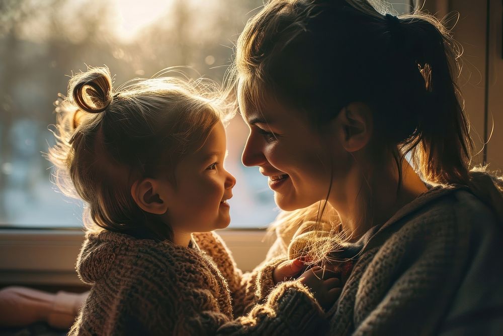 Mother talking to her child human happy baby. 