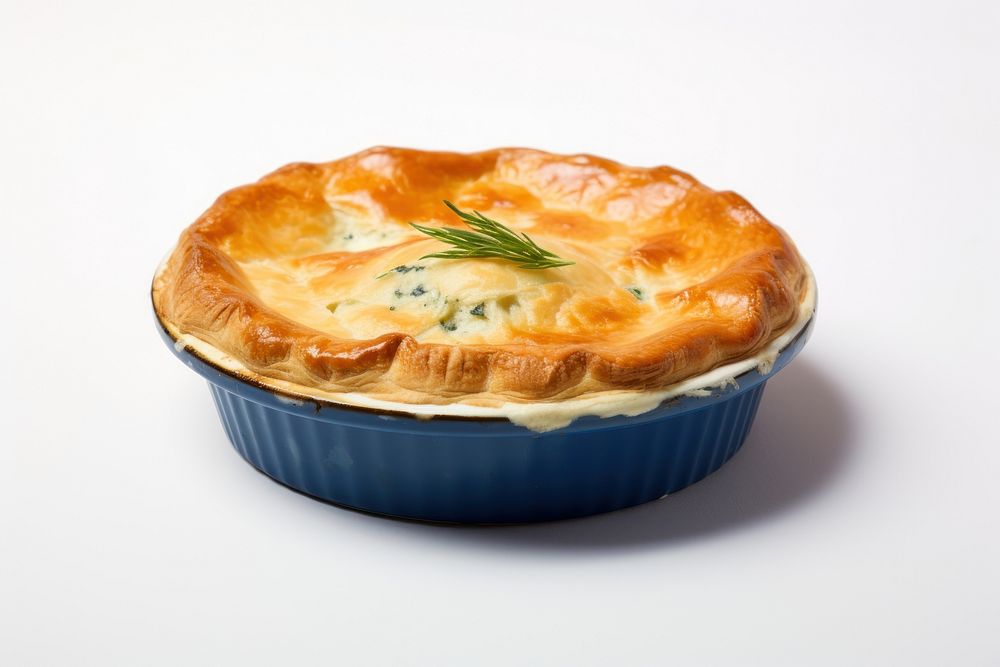 Salmon stuffed pie in a white ceramic dessert pastry baked.