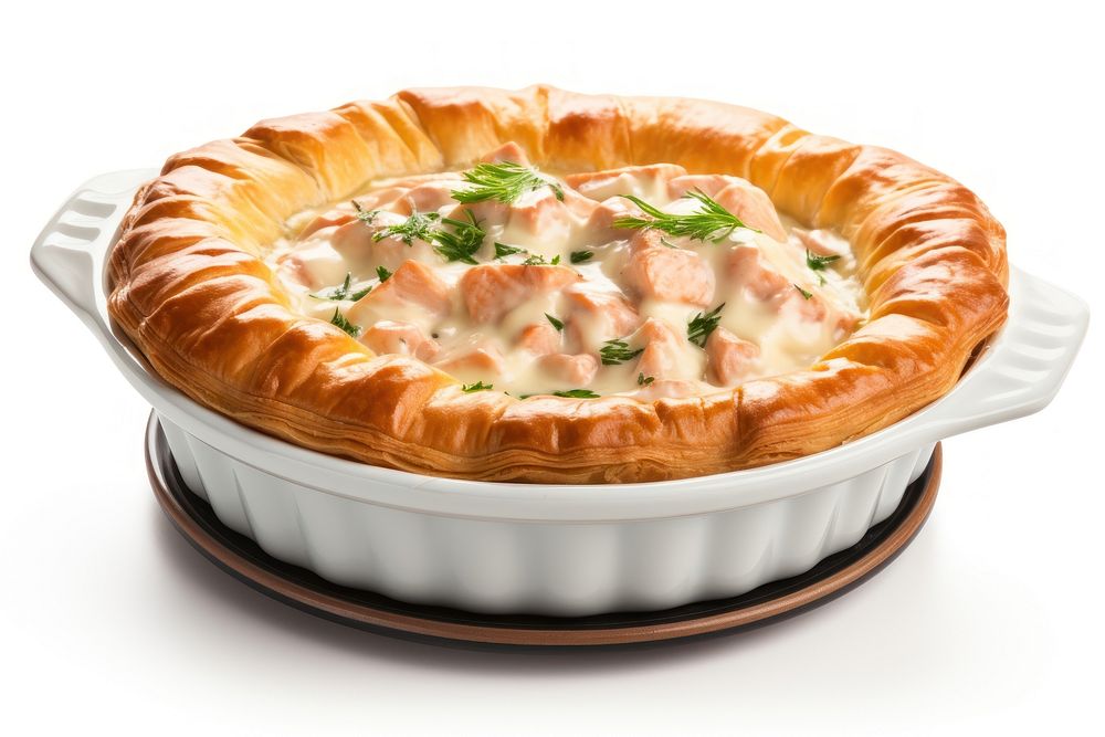 Salmon stuffed pie in a white ceramic dessert pastry baked.