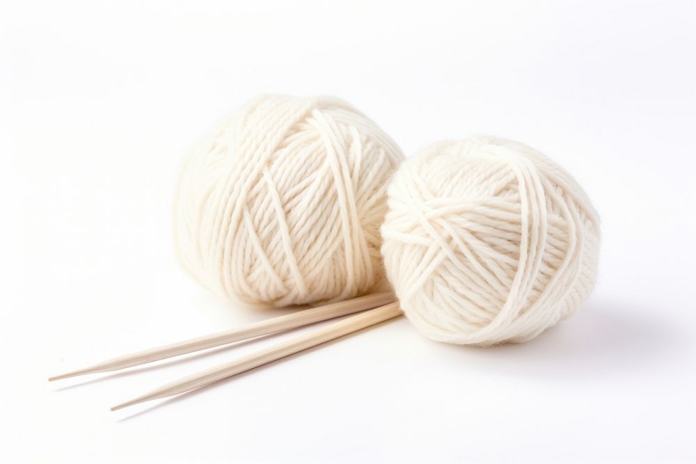 Soft wool yarn and knitting needles white white background xiaolongbao. AI generated Image by rawpixel.