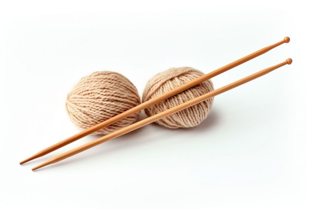 Soft wool yarn and two knitting needles chopsticks white background material. AI generated Image by rawpixel.