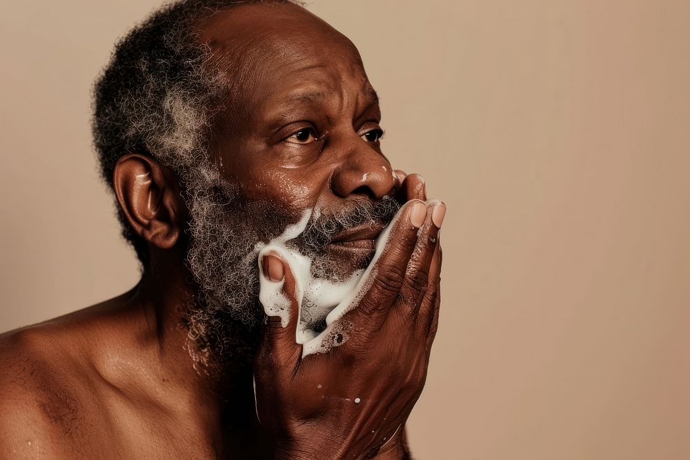 Man using facial wash portrait adult photo.