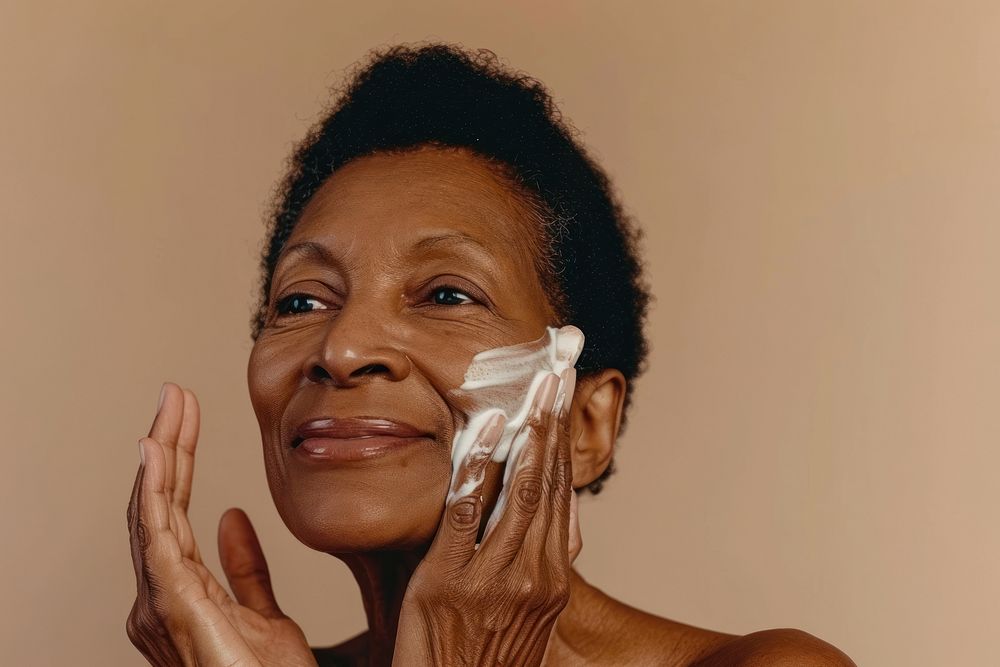 Woman using facial wash portrait adult skin.