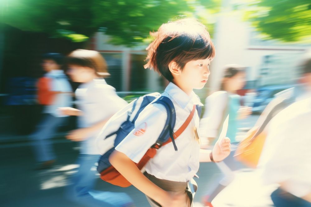 Motion blur little boy in school walk way portrait walking adult.